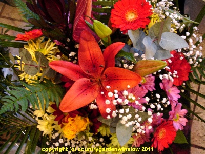 Watermelon burst. AQUA 6 Bouquet of Orange Lillies, Red Carnations and Pink Chrysants