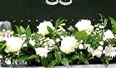 Simple whites top table Arrangement.